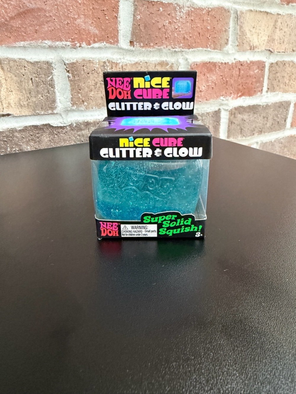 NeeDoh Nice Cube Glitter & Glow Super Squid Squish - Blue Glitter